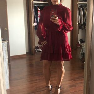 Dark red dress. Light material. With layers